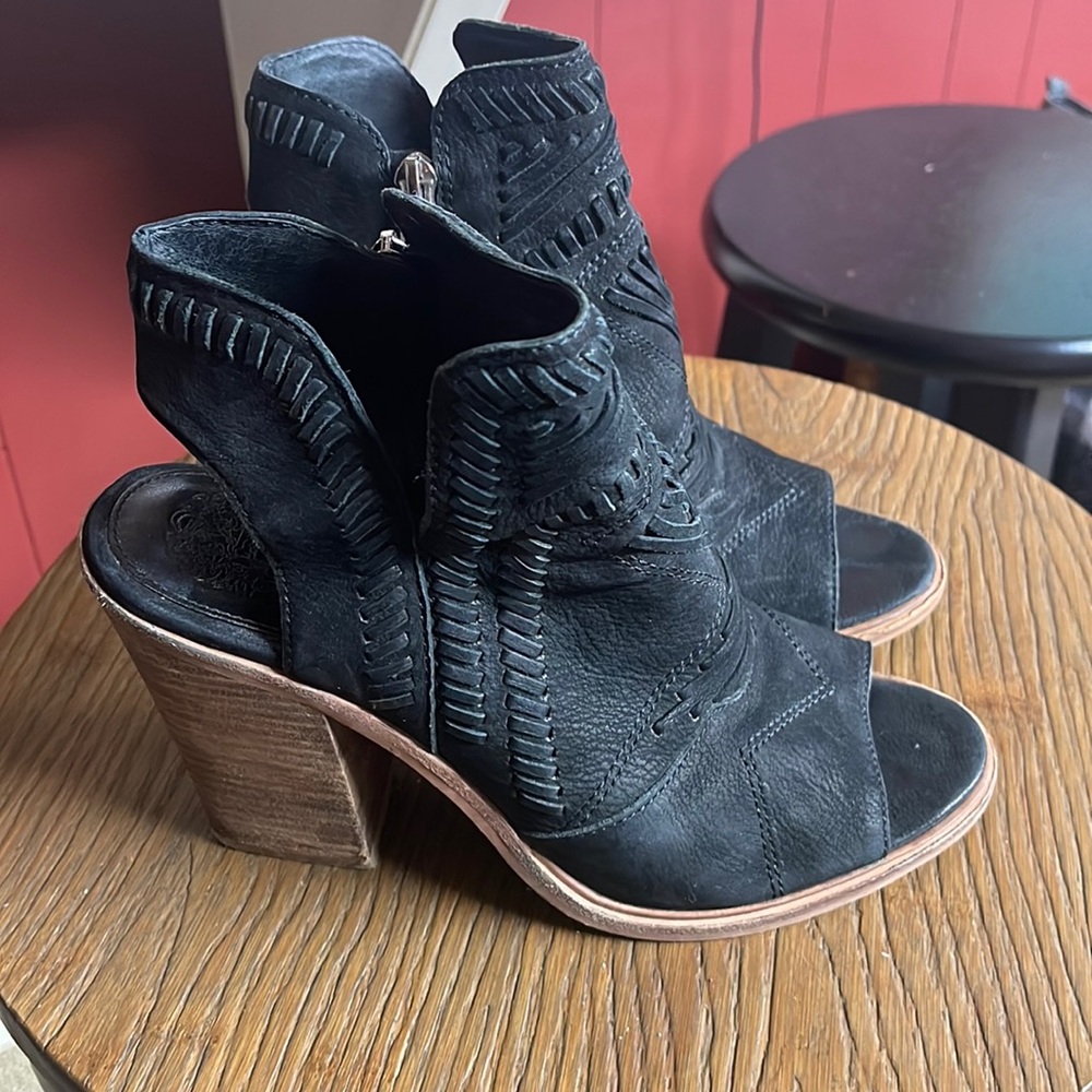 Vince Camuto size 8 used and wear on the back of the heels. See pictures. Black
